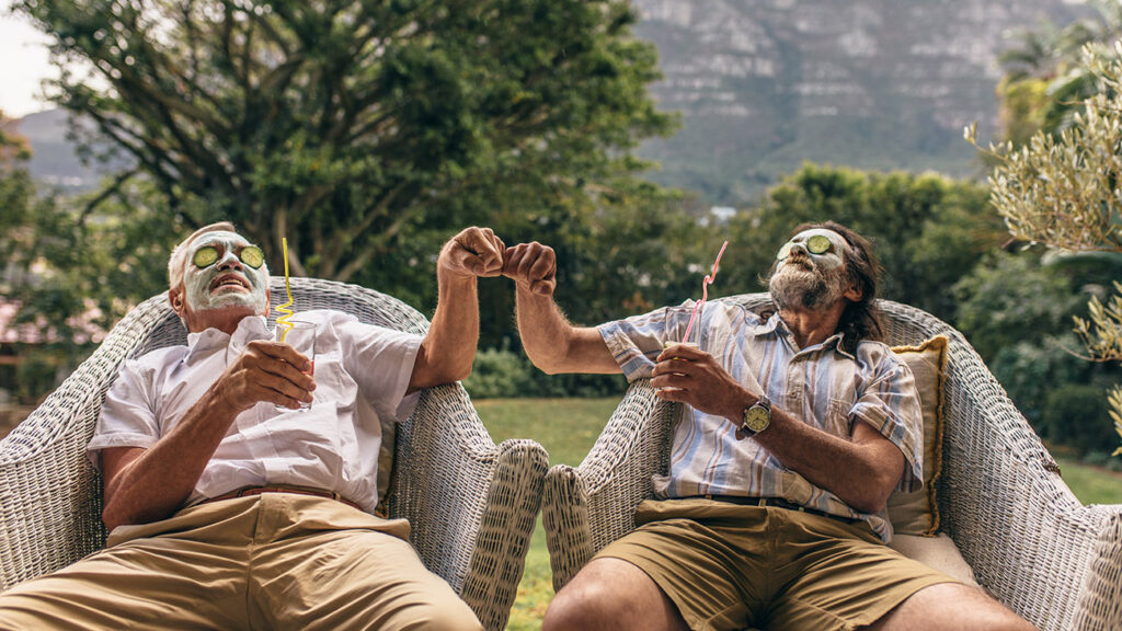 Men's facials with cucumber on eyes